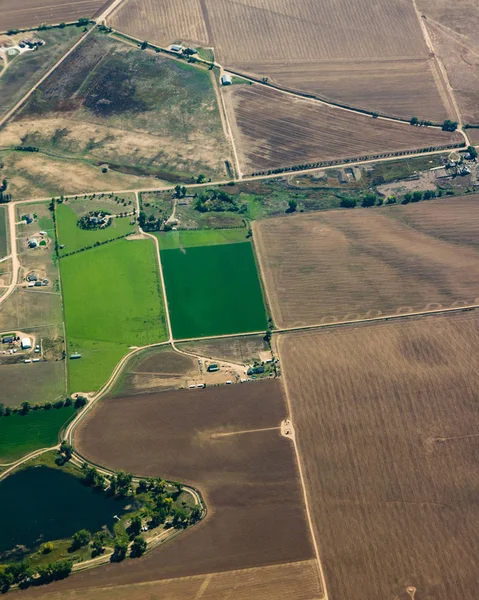 Aerial view of cropland with green pasture — Stock Photo, Image