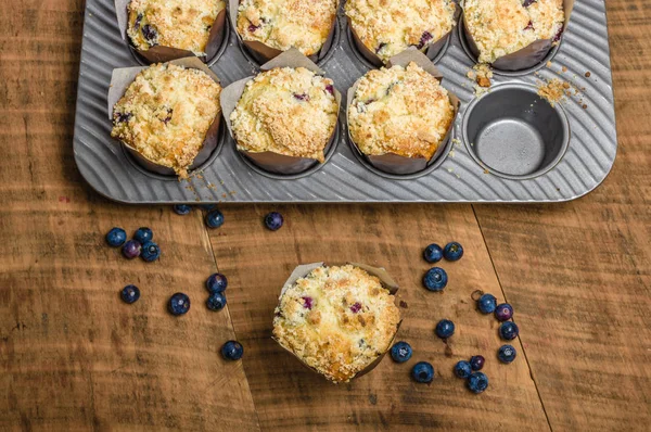 Fresh baked blueberry muffins on table — Stock Photo, Image