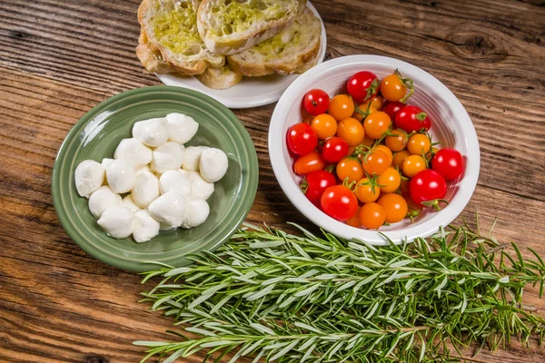 Bread tomatoes and cheese ingredients — Stock Photo, Image