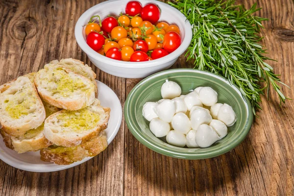 Bread tomatoes and cheese ingredients — Stock Photo, Image