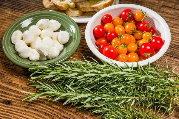 Bread tomatoes and cheese ingredients — Stock Photo, Image