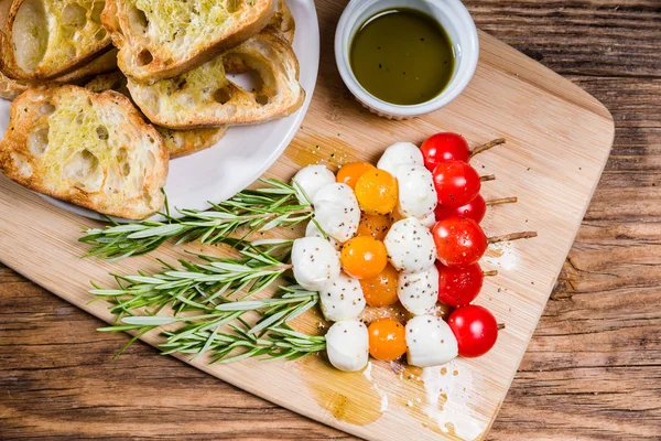 Tomato cheese and bread appetizers Stock Photo