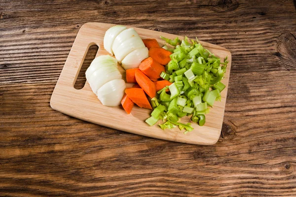 Vegetable mirepoix on a cutting board Stock Picture