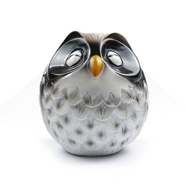The Owl statue on white background