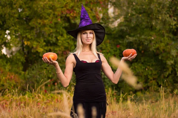 Young woman in Halloween costume practicing yoga — Stock Photo, Image