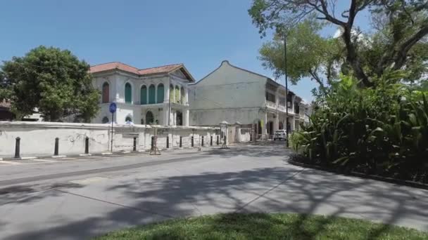 Motorcyclist pass the road at Armenian Street. — Stock Video