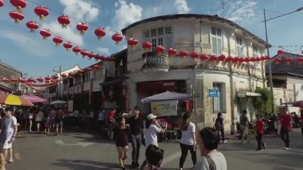 Visiteur payer une visite dans la soirée à la vieille rue du patrimoine de Penang . — Video