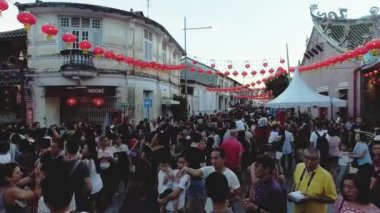 Kaydırma kalabalık ziyaret Çin yeni yılı kutlama Penang Caddesi'nde vurdu.
