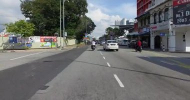 Burmah Road'da Tune Hotel öğleden sonra binmek..