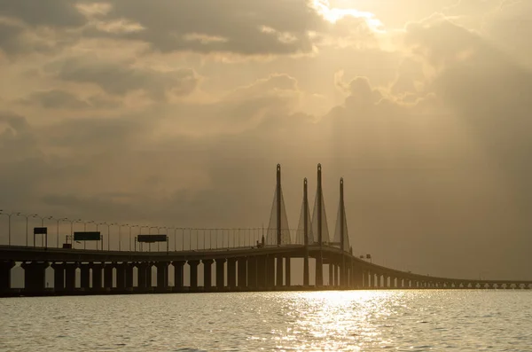 Main span of Penang second bridge in golden cloud morning.