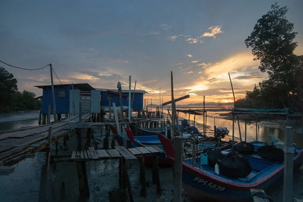 stock image A house at the fishing village beside mangrove tree.