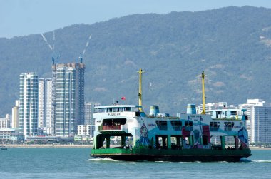 Ferry service at Penang sea. clipart