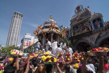 Thousand of Hindu devotees attend to offering at silver chariot