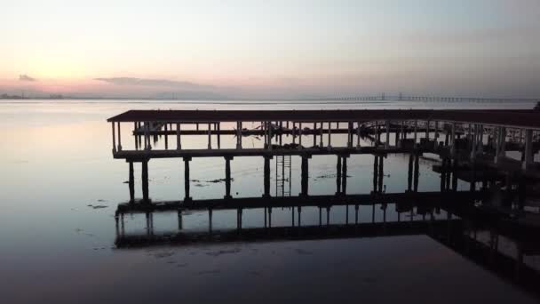 Reveal shot of Penang Bridge from fisherman pier at Penang, Malaysia. — Stock Video