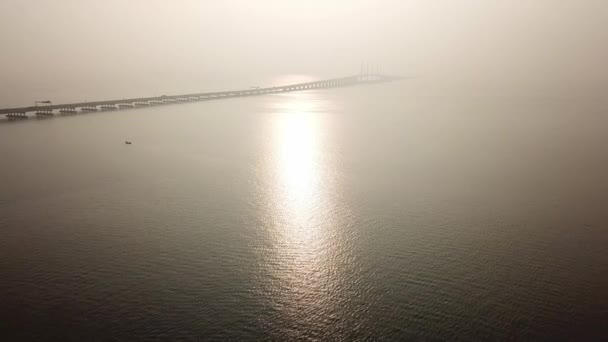 Fly toward Penang Bridge in early morning at Malaysia, Southeast Asia. — Stock Video