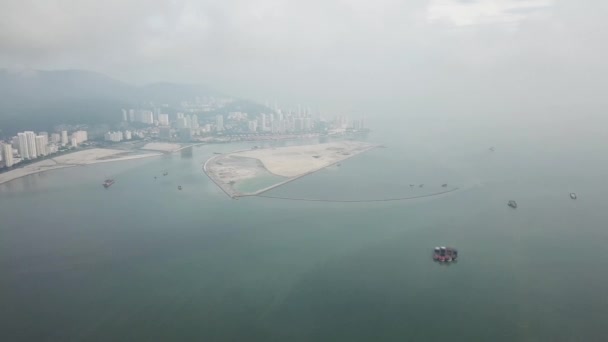 Aerial Penang Wharf reclamation land in haze. — Stock Video