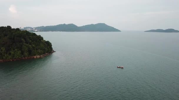 Aerial orbiting boat at sea at Sungai Batu, Penang. — Stock Video