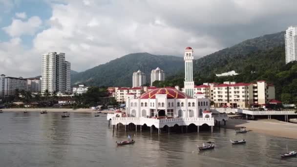 Aerial tracking floating mosque. — Stock Video