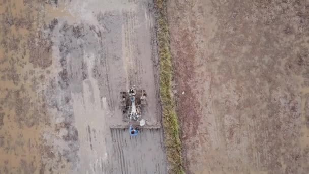 Top view two wheel tractor plowing in the farm. — Stock Video