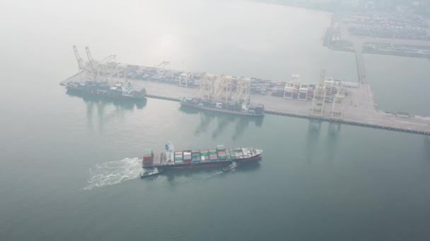 Aerial view tugboat pull the container ship into Penang Port (NBCT) — Stock Video