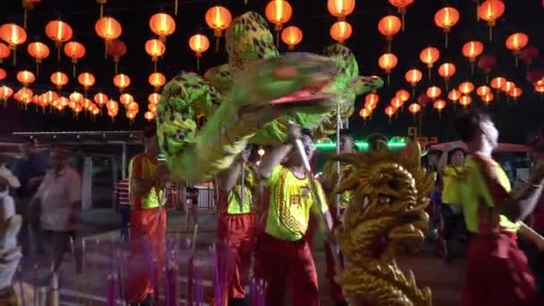 Snake dance at Snake Temple decorated with red lutern. — Stock video