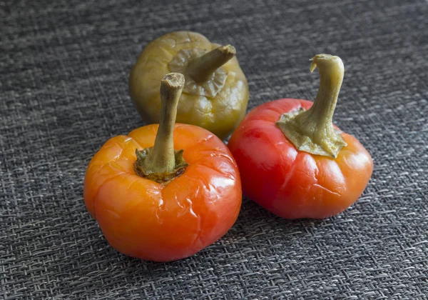 Peppers on gray background — Stock Photo, Image