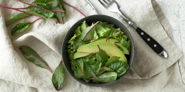 Green vegan breakfast meal in bowl. Clean eating, dieting, vegan food concept