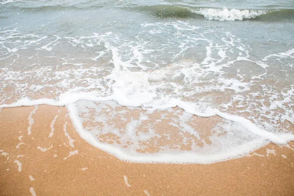 Getijde water strand, Oceaan, achtergrond, schuim — Stockfoto