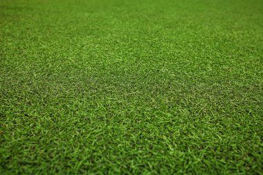 Yeşil suni çim futbol sahası. Yeşil arka plan.