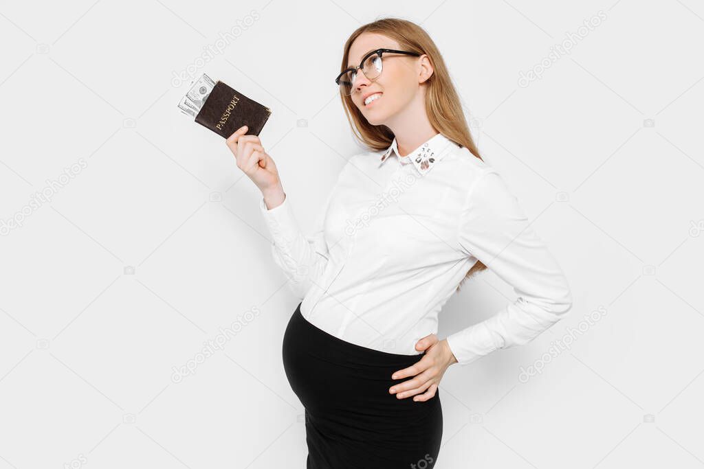 Image of a young pregnant businesswoman in glasses, a girl with a passport and money, preparing for a long-awaited vacation, on a white background