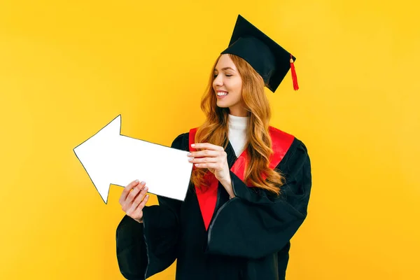 Happy Beautiful Graduate Holds Clean Paper Layout Pointing Copy Space — Stock Photo, Image