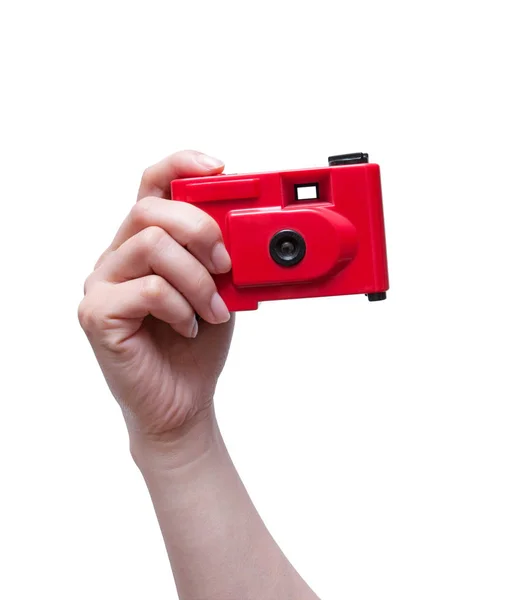 Fotocamera in una mano isolata su sfondo bianco — Foto Stock