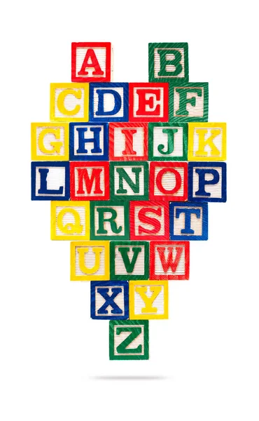 Blocchi di alfabeto in legno isolati su sfondo bianco — Foto Stock