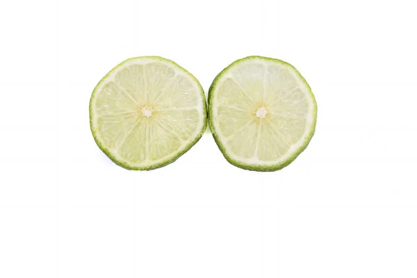 Green Lime with slice cutting isolated on white background — Stock Photo, Image