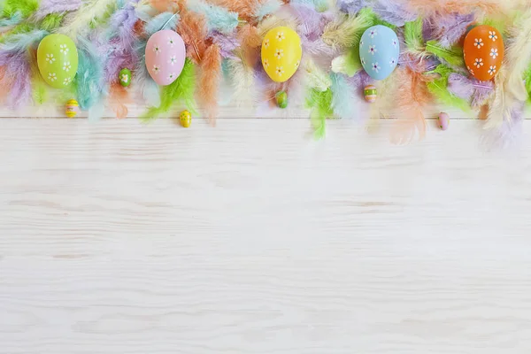 Top View Colored Easter Eggs Feathers White Wooden Background Easter — Stock Photo, Image