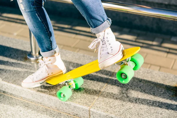 Girl with penny skateboard shortboard. — Stock Photo, Image