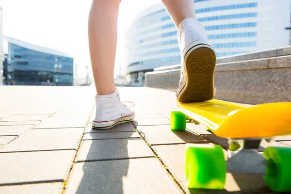 Girl with penny skateboard shortboard. — Stock Photo, Image