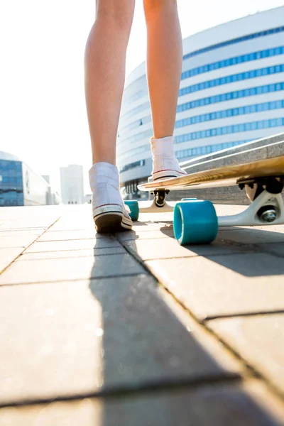 Girl with wooden longboard skateboard. — Stock Photo, Image