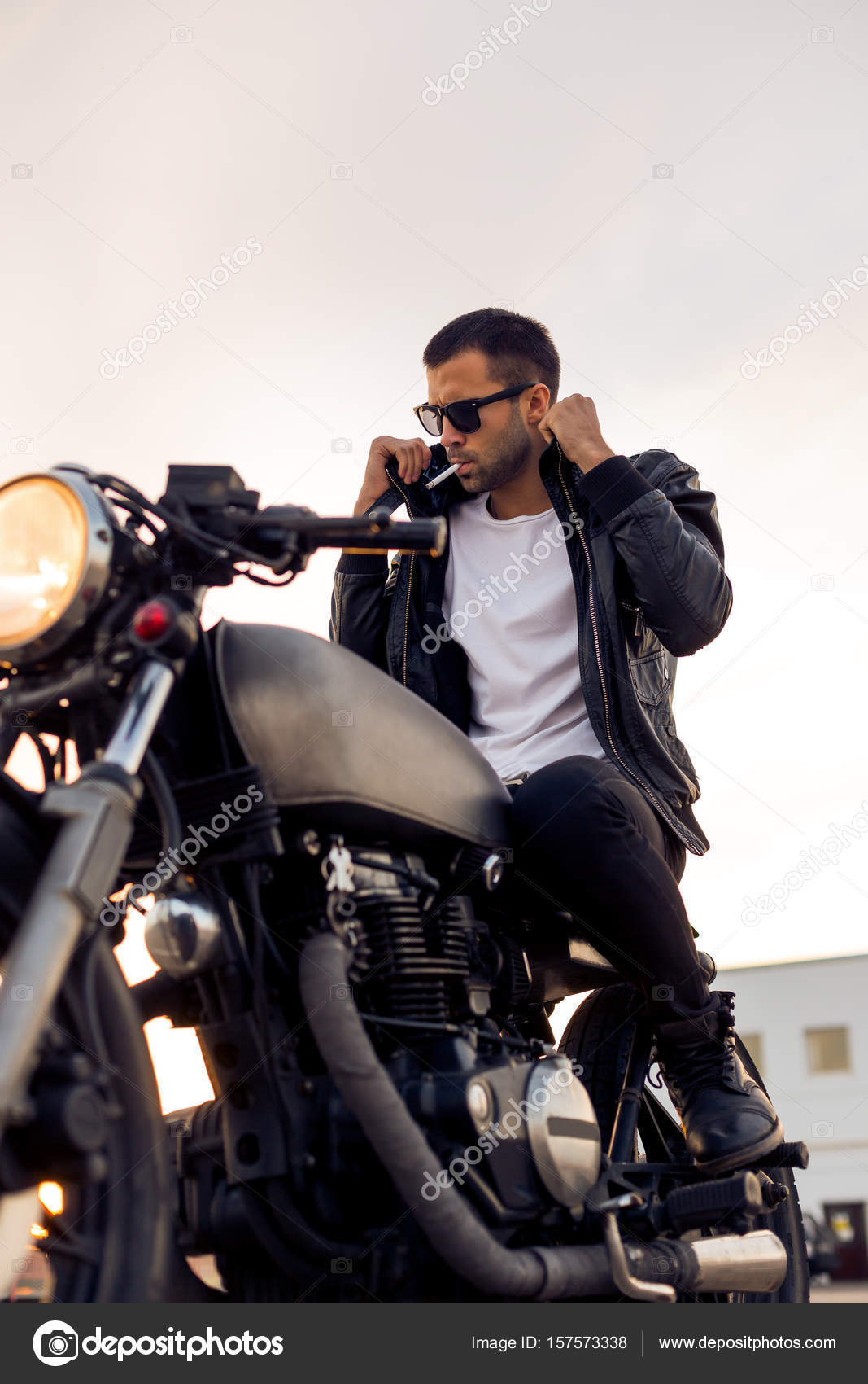 Brutal man sit on cafe racer custom motorbike. Stock Photo by ©nikkolia 157573338 Brutal Man Sit On Cafe Racer Custom Motorbike. Stock Photo By ©Nikkolia 157573338