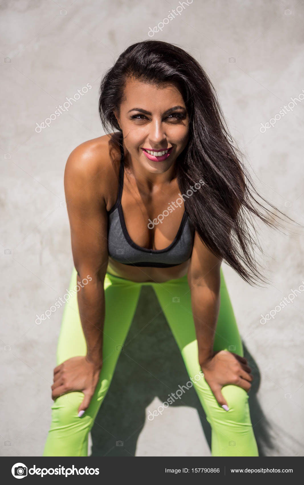 Fitness girl outdoors workout. Stock Photo by ©nikkolia 160489568