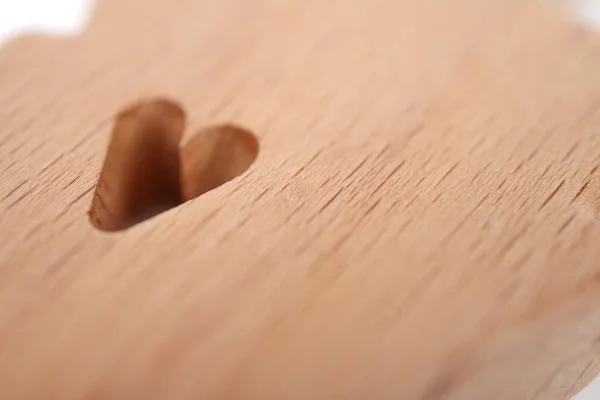 Silhouetten van man, vrouw en hart uitgesneden in de vormen op een witte achtergrond. Gelukkige paar verliefd. Mannetje en vrouwtje, verschillende manieren liefde — Stockfoto