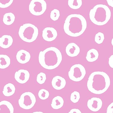 Grunge, pembe arka planda kusursuz daireler çiziyor. Kumaş, ambalaj kağıdı.