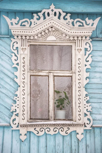 Old carved window of a village house — Stock Photo, Image