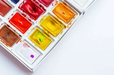 watercolor paints on a white background. Art workshop, art school.