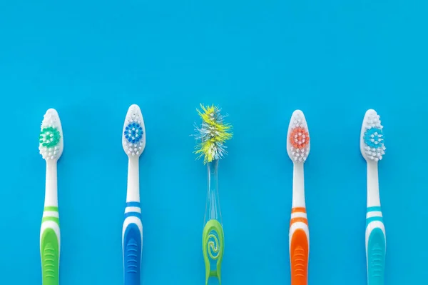 Multicolored Toothbrushes Old Toothbrush Blue Background View Top Concept Dental — Stock Photo, Image