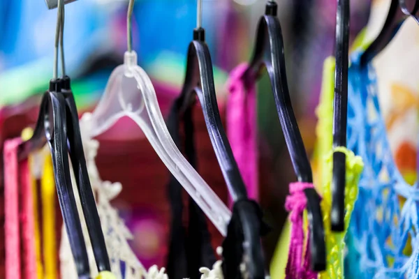 Clothes on rail in clothing store — Stock Photo, Image