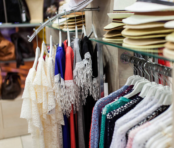 Clothes on rail in clothing store