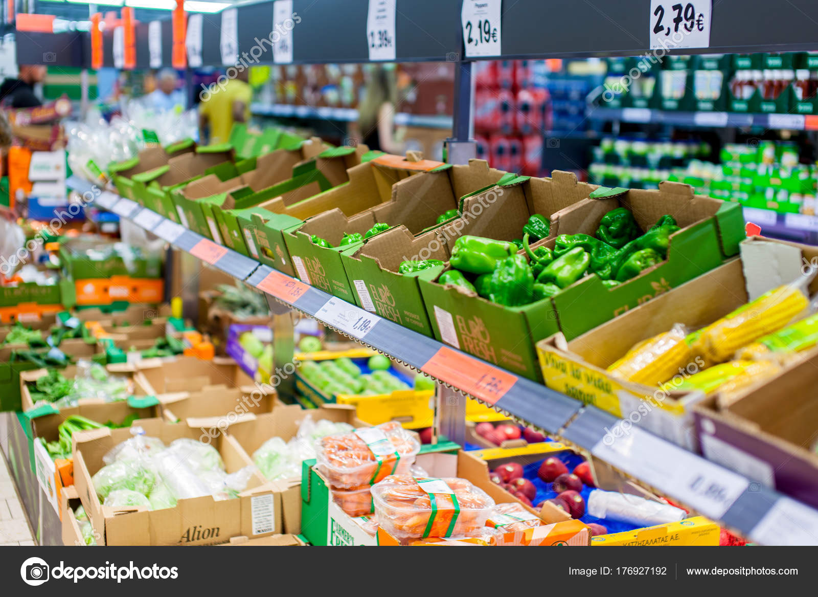 Fruits and vegetables on the shelves at a supermarket Stock Editorial
