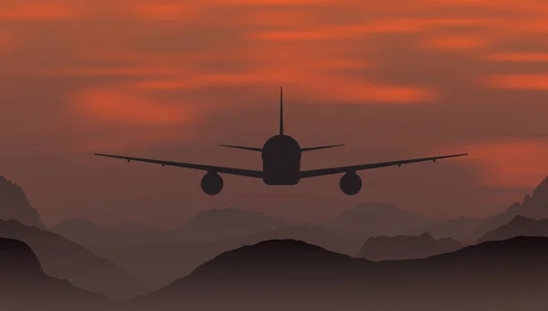 Un avión volando al atardecer en las montañas . — Vector de stock