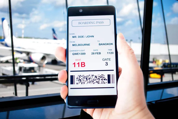 Electronic boarding pass on the screen of smartphone